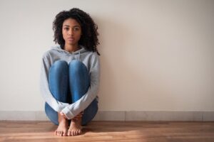 teenage girl looking sad